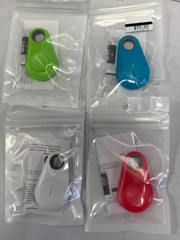 lot 69 image: Lot of 4 GPS Luggage, Key, etc Finder