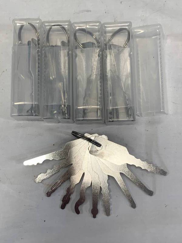 lot 103 image: Lot of 5 Vehicle Lock Out Jiggler Key Sets (10pc sets )