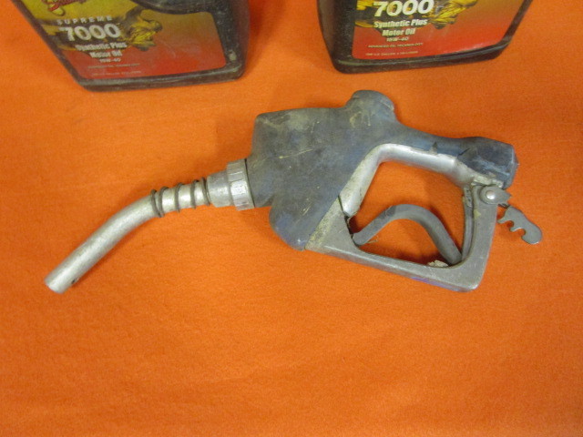 lot 55 image: Gas Nozzle & Oil