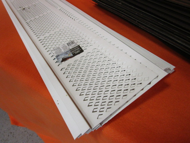 lot 112 image: Gutter Guard 24pcs 72 of Brown 10pcs 30 of White