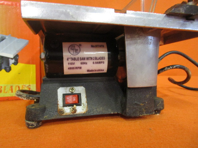 lot 126 image: 4 Table Saw & Midland Weather Alert Radio