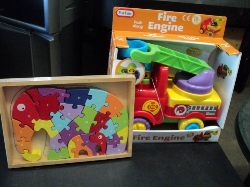 lot 1 image: Fun Time Fire Engine and Wood Eleph...