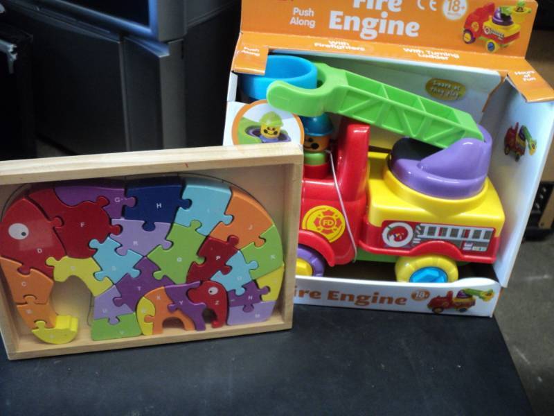 lot 2 image: Fun Time Fire Engine and Wood Eleph...