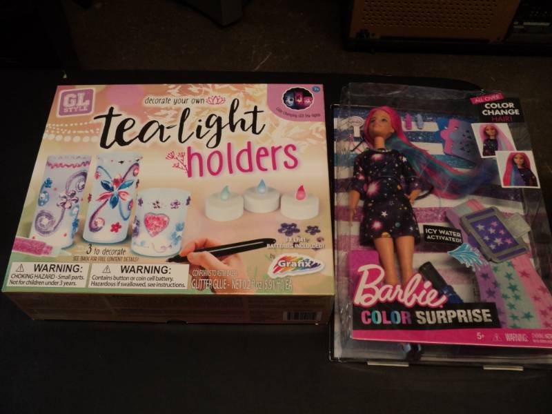 lot 17 image: Barbie Color Surprise and Tea Light...