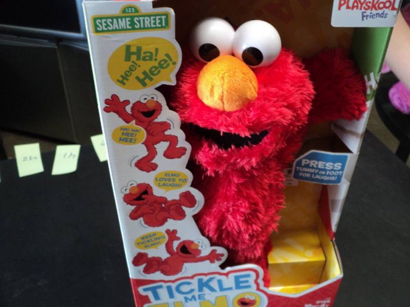 lot 34 image: Tickle Me Elmo...