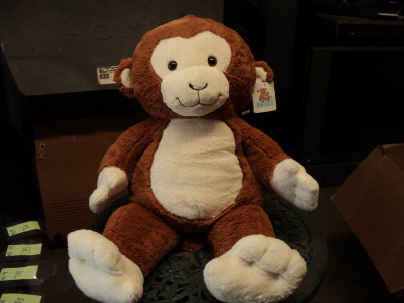 lot 73 image: Stuffed Happy Monkey...