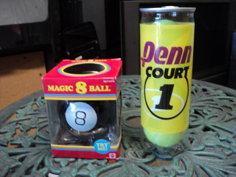 lot 129 image: Magic 8 Ball and 3 Pack of Tennis B...