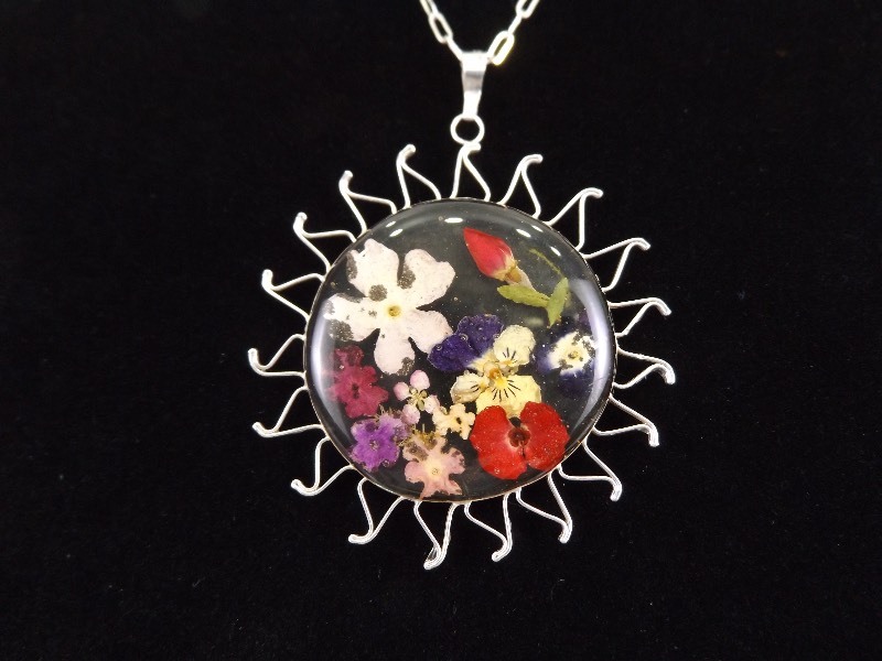 lot 15 image: .925 Sterling Silver Sun Disk Floral Preserve Pendant Necklace