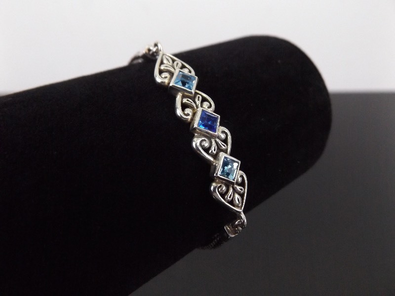 lot 30 image: .925 Sterling Silver Topaz and Sapphire Crystal Bracelet