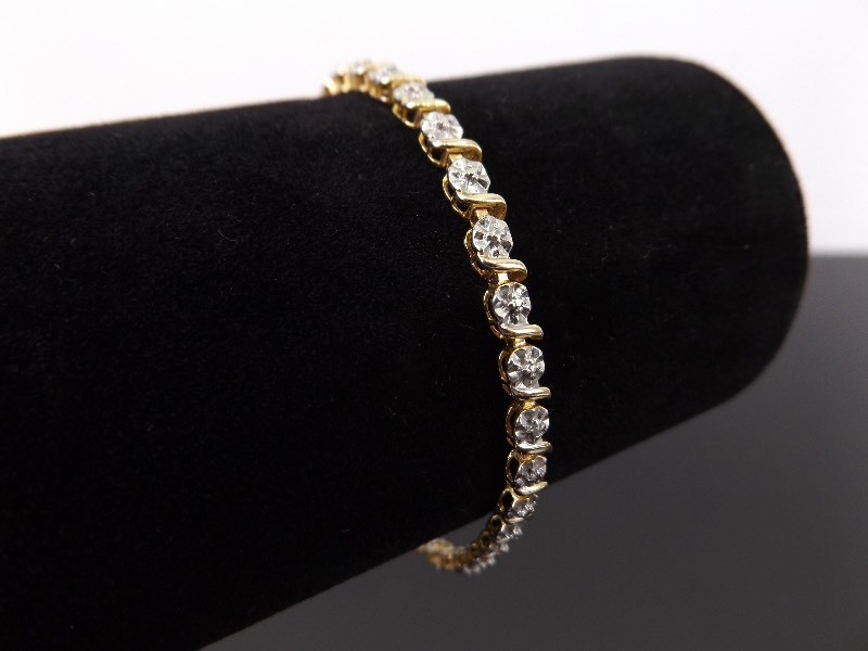 lot 35 image: .925 Sterling Silver Accented Vermeil Tennis Bracelet