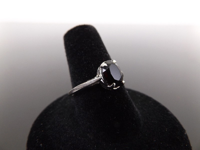 lot 57 image: .925 Sterling Silver Faceted Garnet Ring Size 7.75