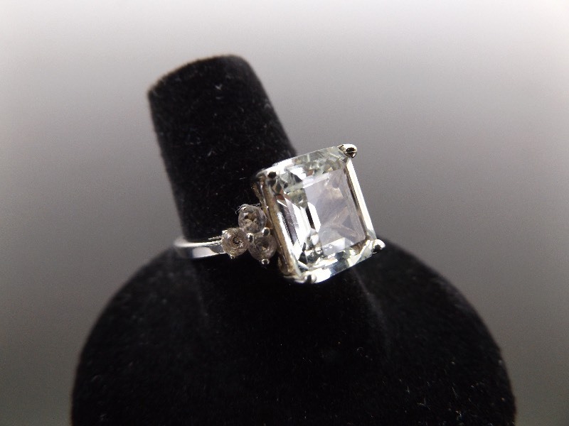 lot 65 image: .925 Sterling Silver Emerald Cut Crystal Ring Size 6.5