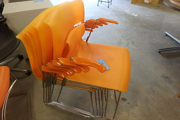 lot 213 image: Six Funky Stacking Orange Chairs