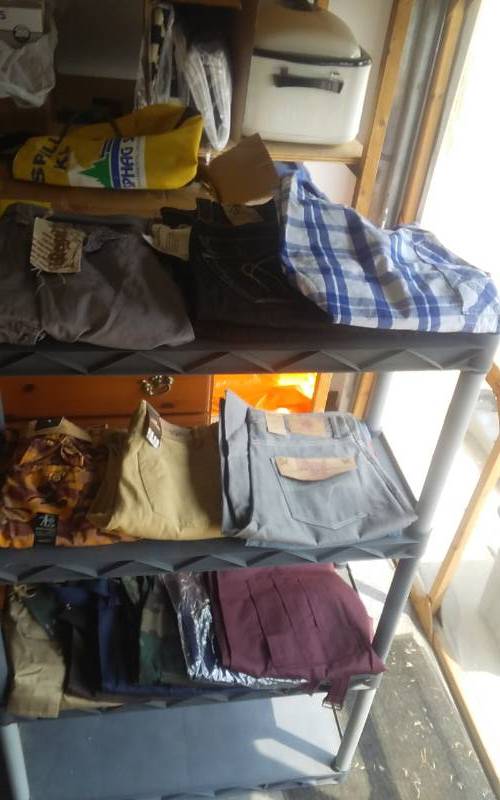 lot 46 image: 2 Pair Pants, 13 Pair Shorts (Waist 34)