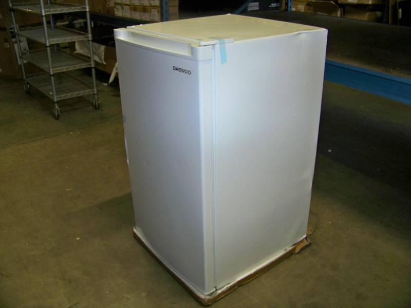 lot 18 image: Daewoo, FR-044RVWE, 4.4 cu.ft., Energy Star, Compact Refrigerator (Fridge) with Freezer Compartment - NEW with damage in Original, Open Box
