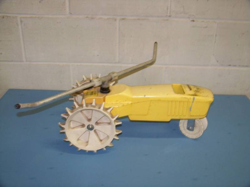 lot 30 image: Nelson, Traveling Tractor Water Sprinkler