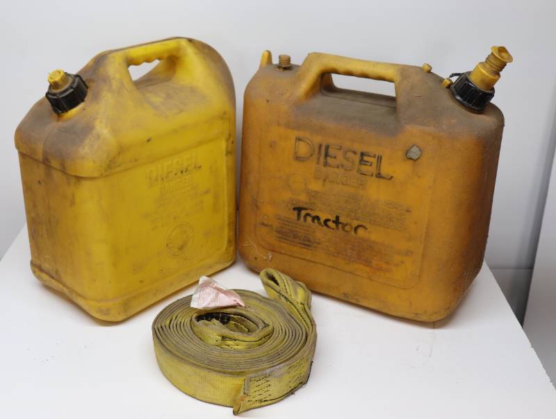 lot 44 image: (2) Diesel Cans & Tow Strap