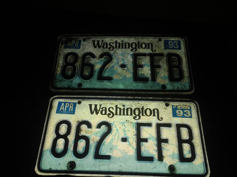 lot 16 image: Two matching Washington license plates.
