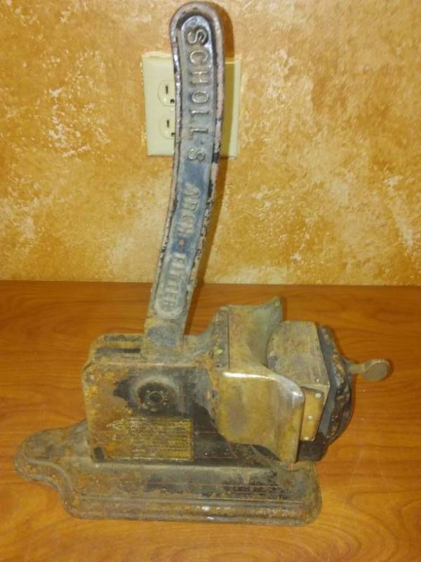 lot 25 image: Cast Scholls Arch lifter for shoes.