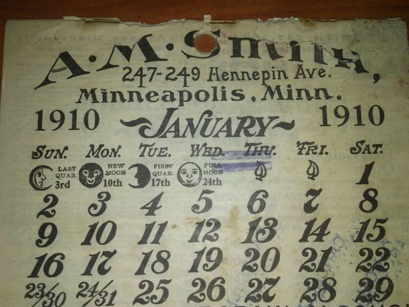 lot 102 image: A. M. Smith 1910 calendar.  Hennepin Avenue Minneapolis.