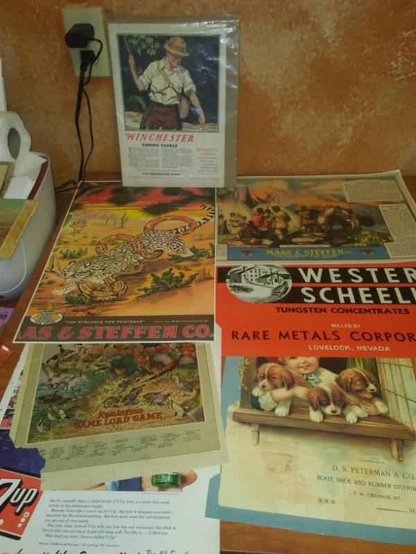 lot 124 image: Advertising - Winchester, Remington,  and more.