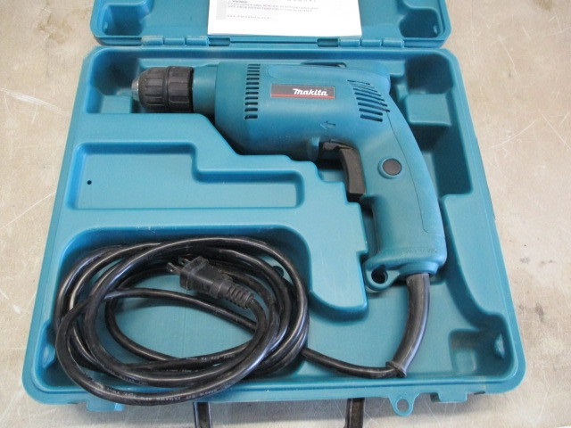 lot 31 image: Makita Drill