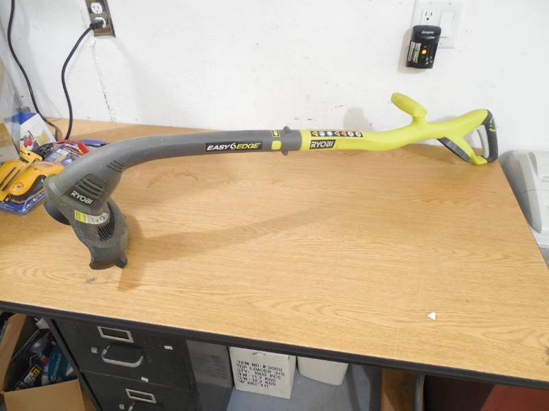 lot 30 image: RYOBI ONE 18-Volt Lithium-Ion Cordless Electric String Trimmer and Edger - Battery and Charger Not Included
