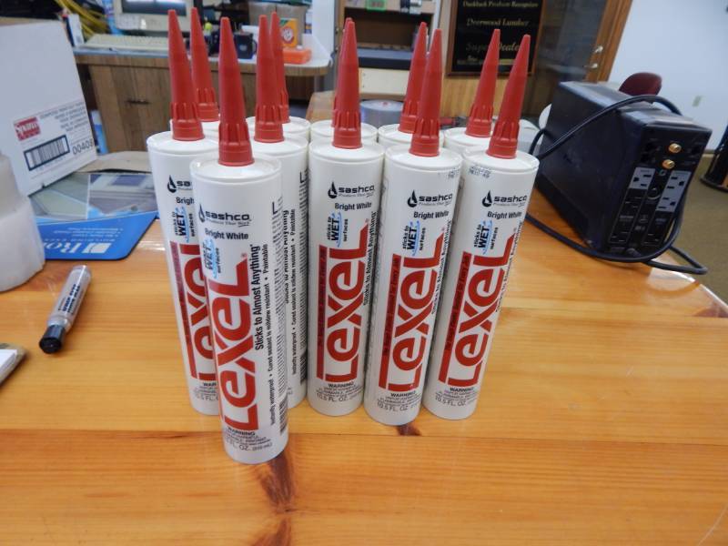 lot 51 image: Sashco Lexel White Caulk