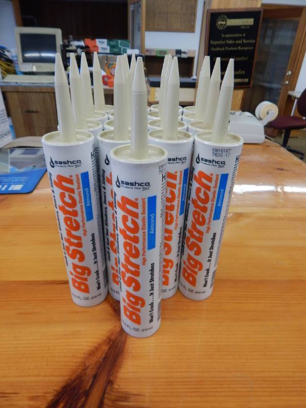 lot 58 image: Sashco Big Stretch Almond Caulk