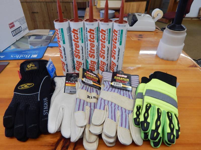 lot 59 image: Sashco Big Stretch Redwood Caulk and Glove Assortment