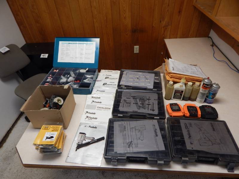 lot 101 image: Paslode and Makita tool repair kits and manuals