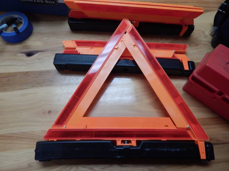 lot 187 image: Safety triangles for travel and tool pouch