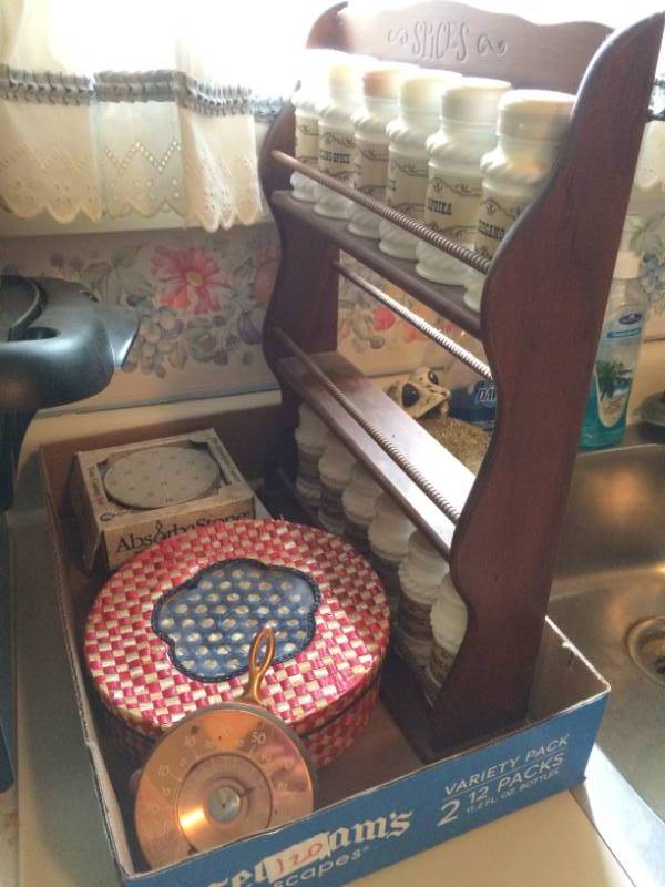 lot 120 image: Spice Rack, Wicker Pot Holders, and Coasters