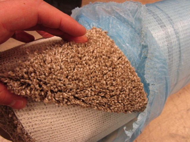 lot 703 image: ROLL OF NEW CARPET