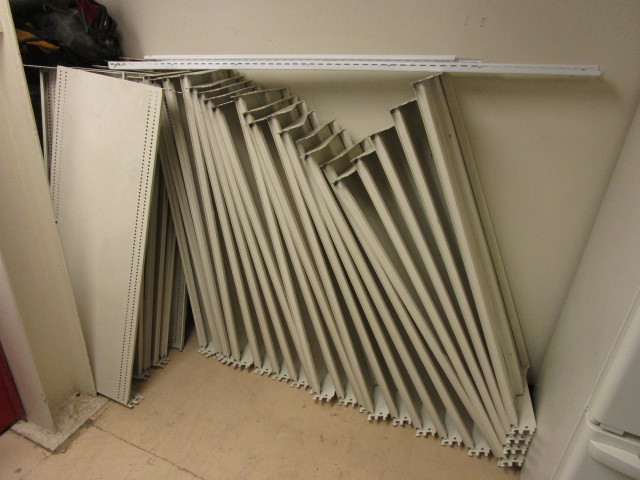 lot 728 image: WALL MOUNTED STORAGE RACKS