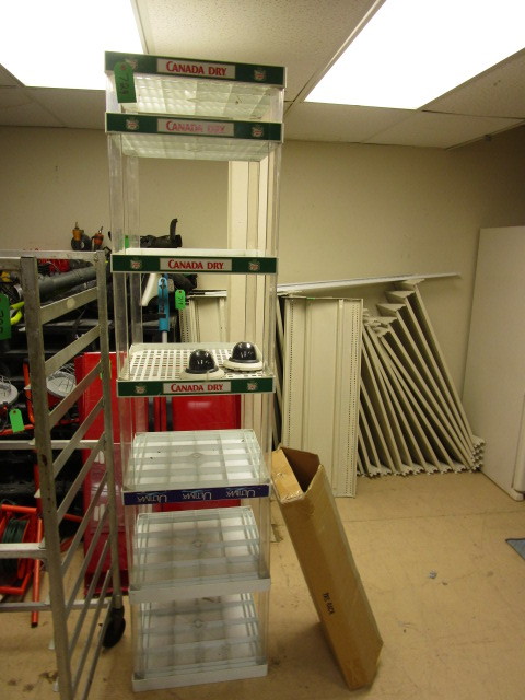 lot 729 image: OVERHEAD SECURITY CAMERAS, PRODUCT DISPLAY, AND SUNGLASSES DISPLAY