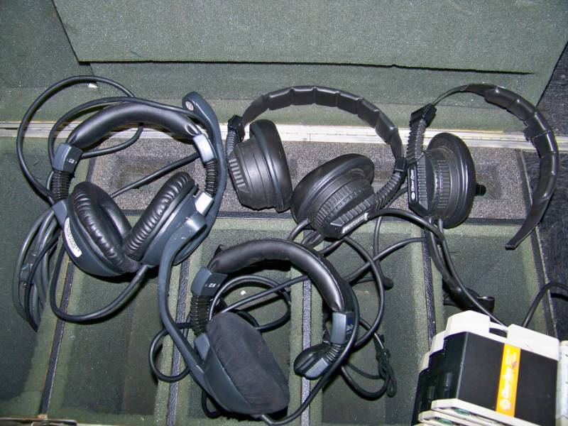lot 34 image: Clear-Com Broadcast Communication Audio System - Headphones with Microphones in Hard Sided Travel Case w Casters