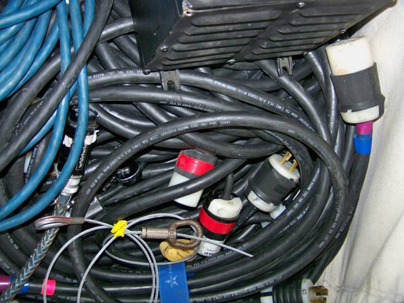 lot 108 image: Large Canvas Rolling CartBin Half Full of Professional AudioVideo Cables