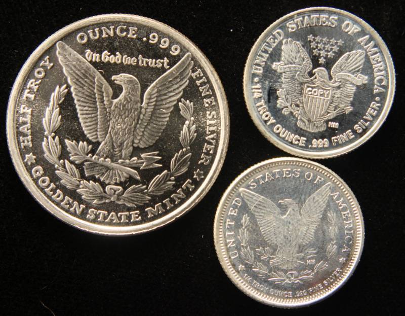 lot 10 image: 1 TROY OZ. .999 FINE SILVER (1 X 12 OZ & 2 X 14 OZ)