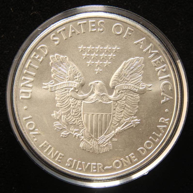 lot 16 image: 2010 AMERICAN SILVER EAGLE 1 TROY OZ. .999 FINE SILVER IN AIRTITE