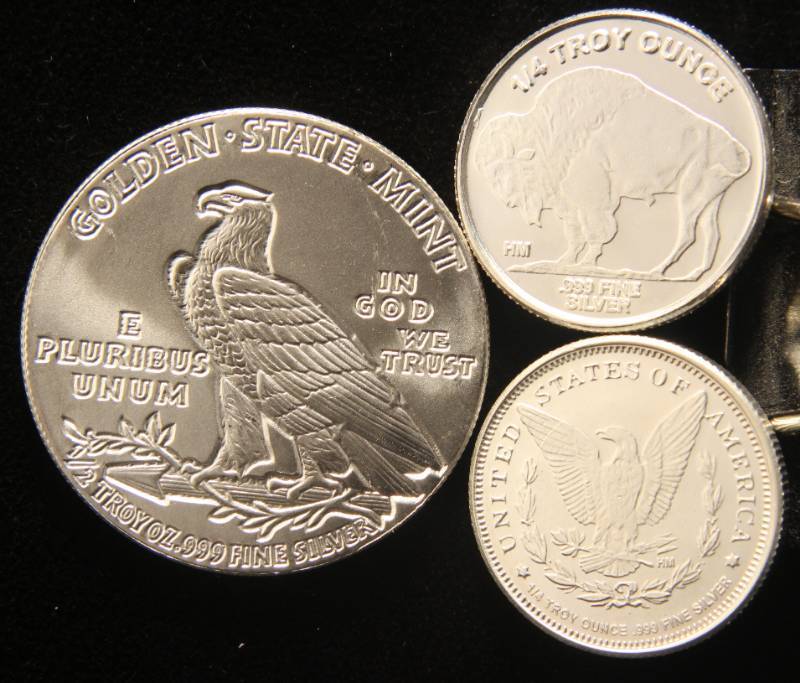 lot 21 image: 1 TROY OZ. .999 FINE SILVER (1 X 12 OZ & 2 X 14 OZ)