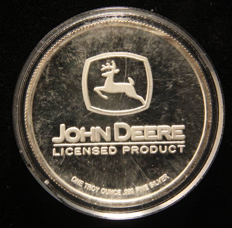 lot 24 image: 1 TROY OZ. .999 FINE SILVER JOHN DEERE 4020 TRACTOR IN AIRTITE