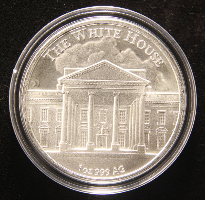 lot 26 image: 1 TROY OZ. .999 FINE SILVER DONALD TRUMP ROUND IN AIRTITE HOLDER