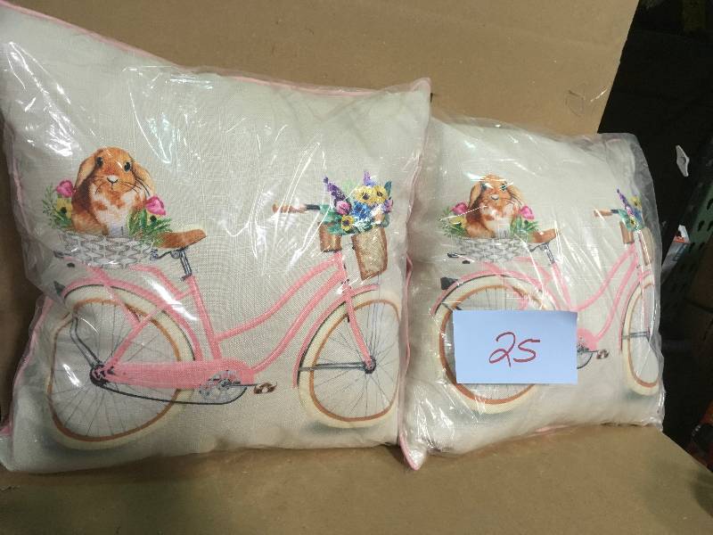 lot 25 image: 18 in. Easter Bunny and Bike Pillow in good condition