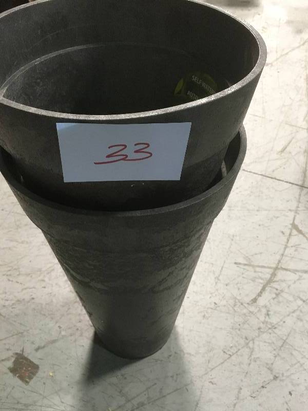 lot 33 image: Tierra Verde Aria 14 in. W x 26 in. H Round Pewter Rubber Self-Watering Planter in good condition
