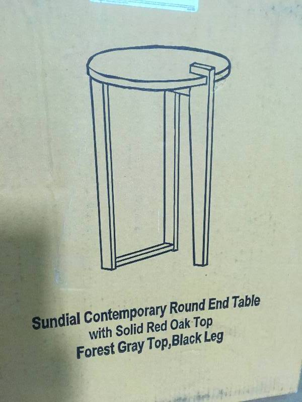 lot 96 image: Sundial Contemporary Round End Table by American Trails in good condition