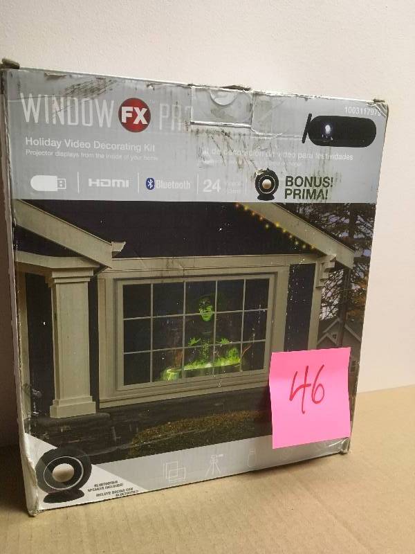 lot 46 image: Window FX Pro Projector with Bluetooth and 3-Watt Speaker  in good condition
