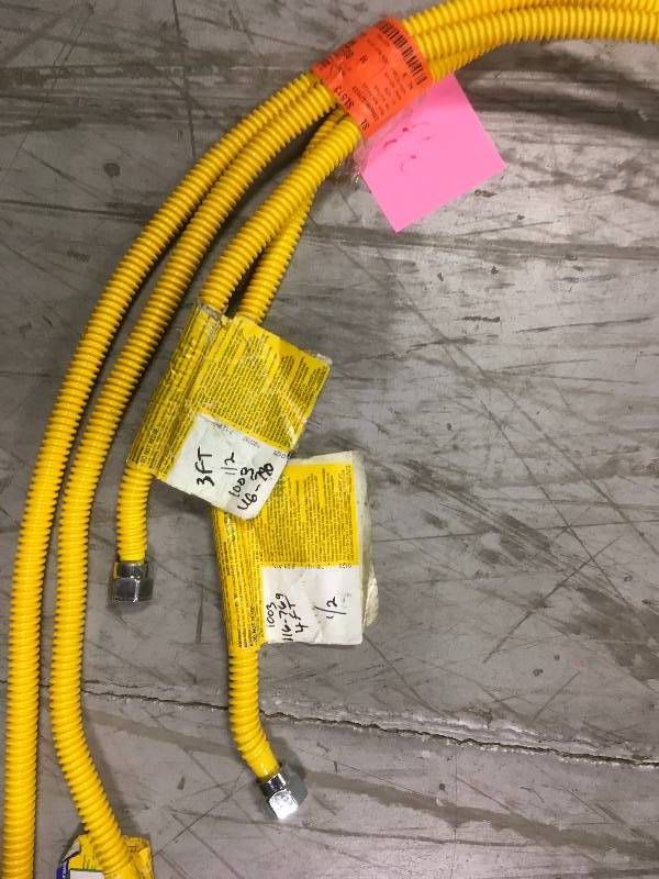 lot 73 image: BrassCraft 12 in. MIP x 12 in. MIP x 48 in. Gas Connector (58 in. OD) wSafetyPlus2 Thermal Excess Flow Valve (106,000 BTU)  in good condition