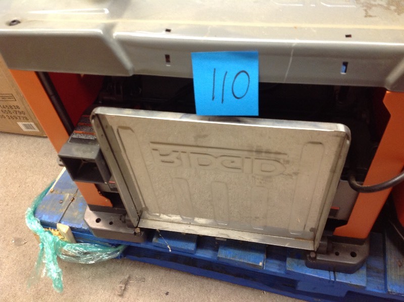 lot 110 image: RIDGID 13 in. Thickness Corded Planer used in working conditions