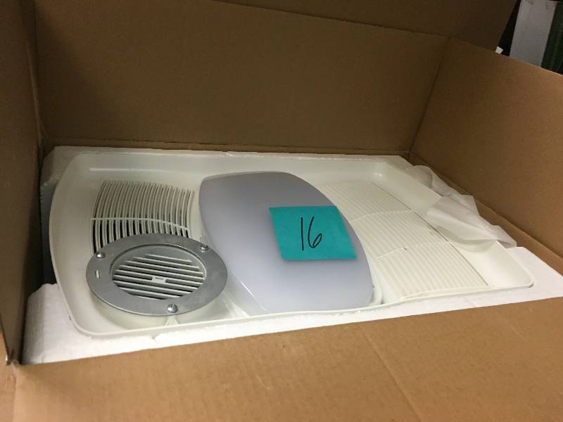 lot 16 image: NuTone 100 CFM Ceiling Bathroom Exhaust Fan with Light and Heaterin good condition